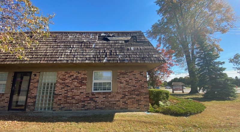 Damaged roof that needs roof replacement