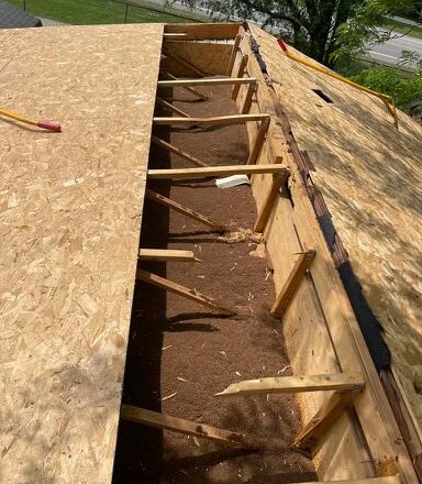 Picture of a mobile home's roof being replaced