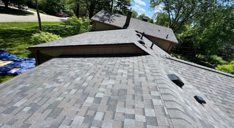 Freshly replaced shingles on a roof